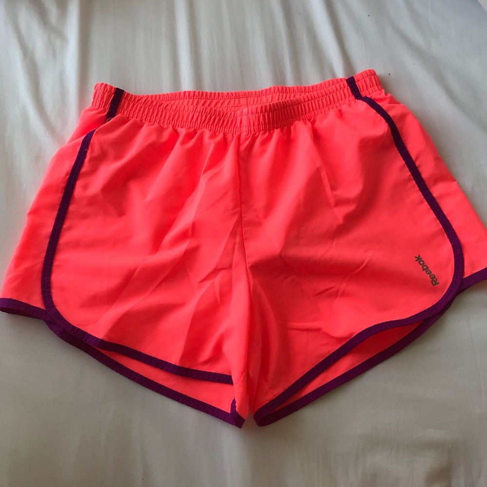 bright orange reebok shorts, large, worn once